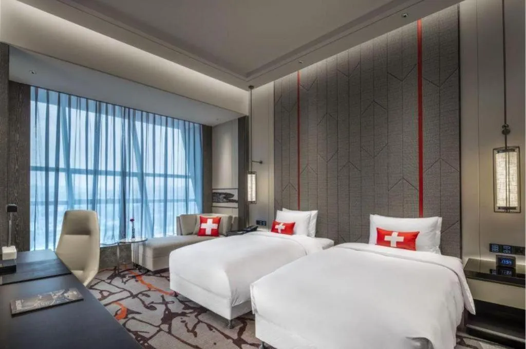 Bed in Swisstouches Hotel Ankang