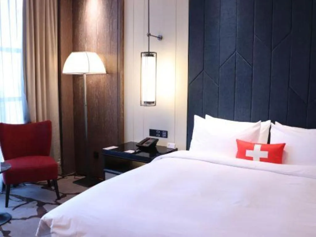 Bed in Swisstouches Hotel Ankang
