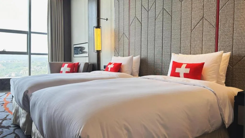 Bed in Swisstouches Hotel Ankang