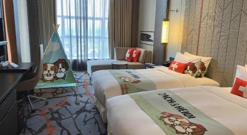 Bed in Swisstouches Hotel Ankang