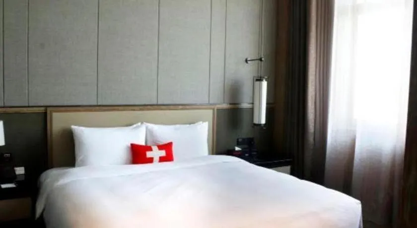 Bed in Swisstouches Hotel Ankang