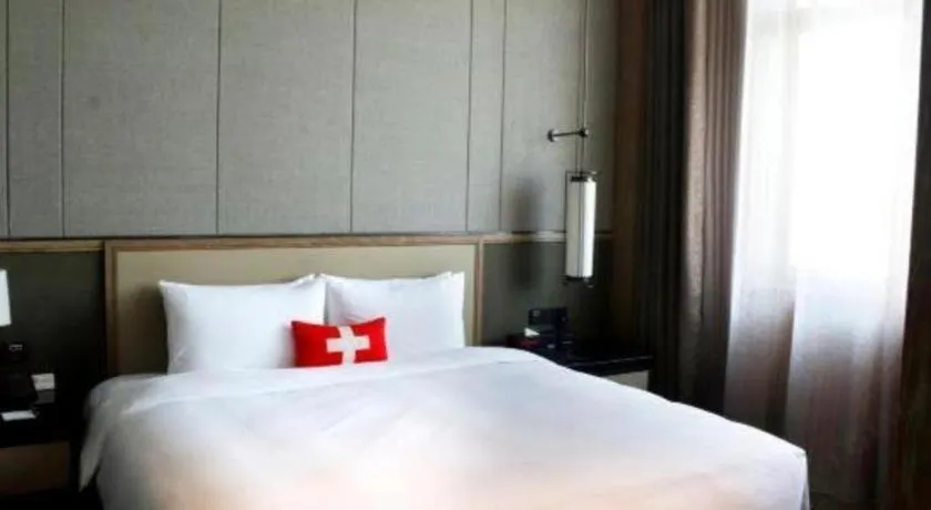 Bed in Swisstouches Hotel Ankang