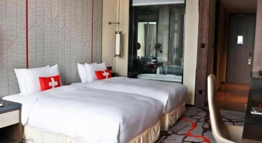 Bed in Swisstouches Hotel Ankang