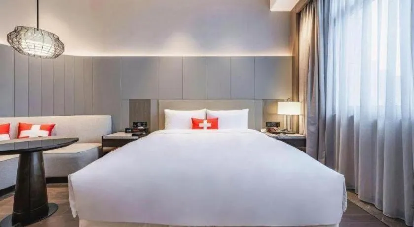 Bed in Swisstouches Hotel Ankang