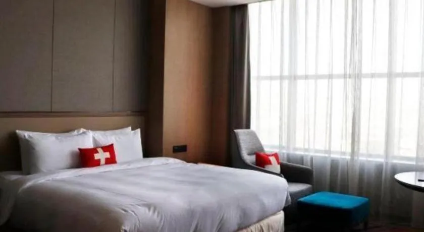 Bed in Swisstouches Hotel Ankang