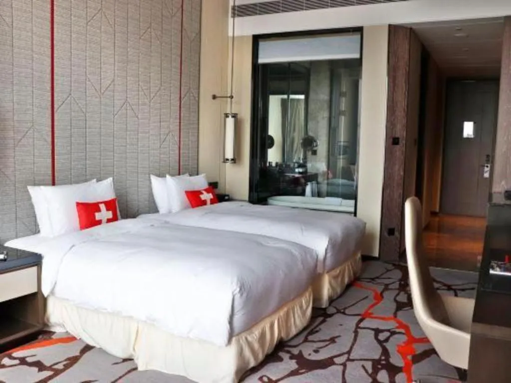 Bed in Swisstouches Hotel Ankang