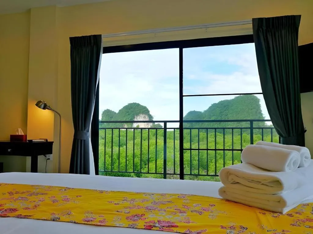 Bed in The Nest Krabi Hotel