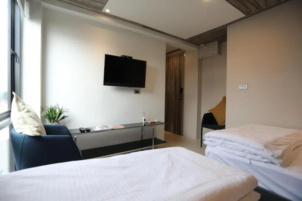 Bed in The River House Chiangkhan Hotel