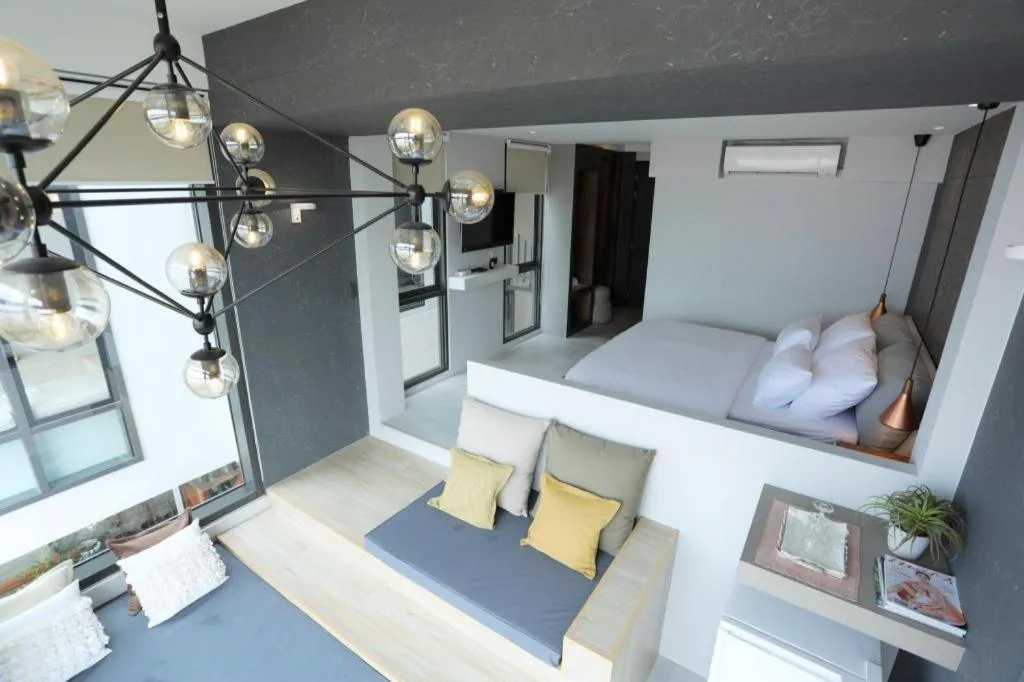 Bed in The River House Chiangkhan Hotel