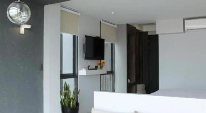 Bed in The River House Chiangkhan Hotel