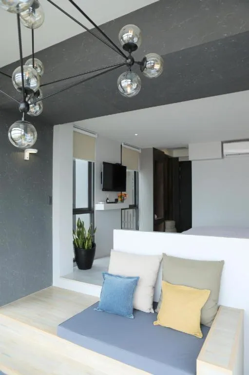 Bed in The River House Chiangkhan Hotel