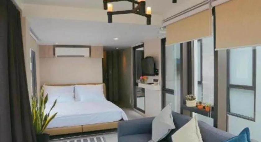 Bed in The River House Chiangkhan Hotel