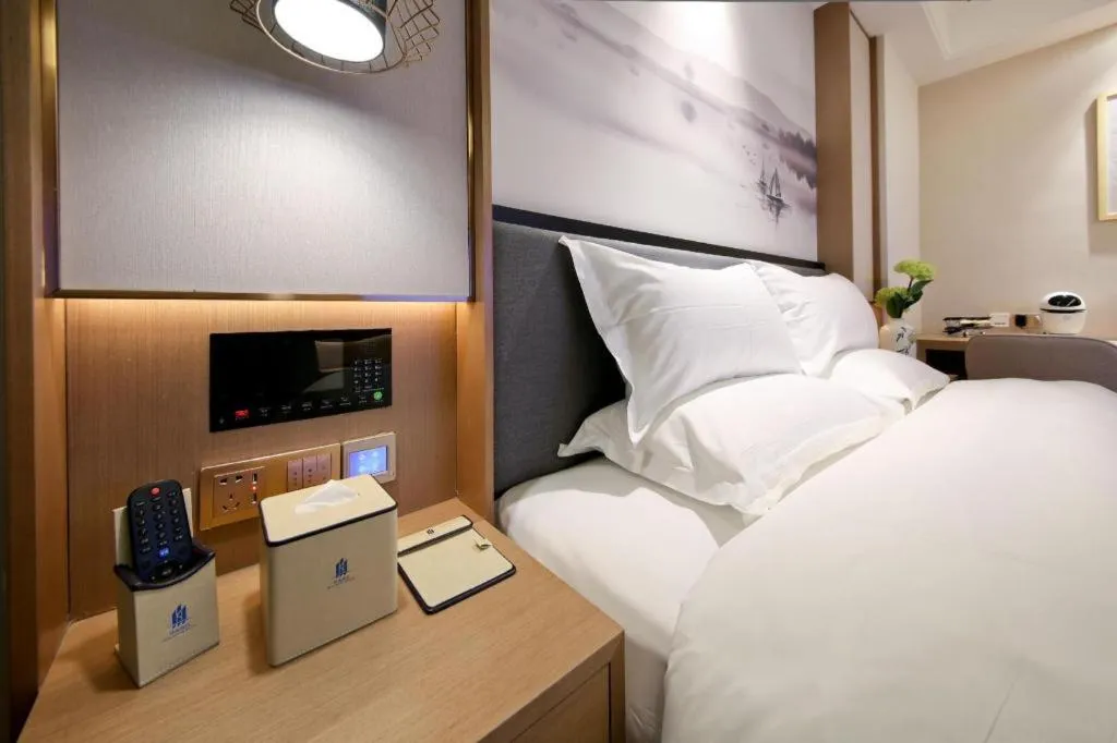 Bed in East Queen Hotel (Xi'an Beimen Metro Station)