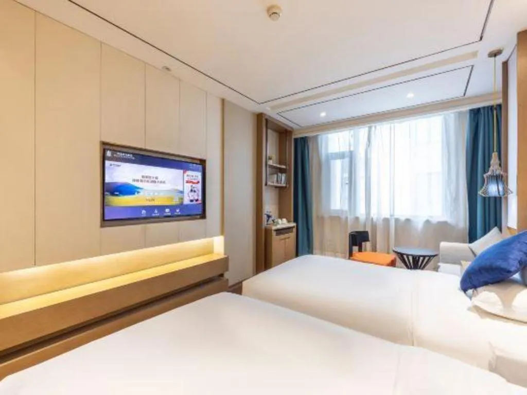 Bed in East Queen Hotel (Xi'an Beimen Metro Station)