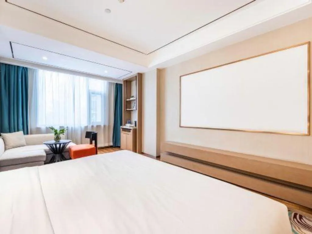 Bed in East Queen Hotel (Xi'an Beimen Metro Station)