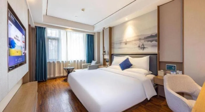 Bed in East Queen Hotel (Xi'an Beimen Metro Station)