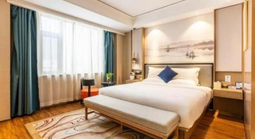 Bed in East Queen Hotel (Xi'an Beimen Metro Station)