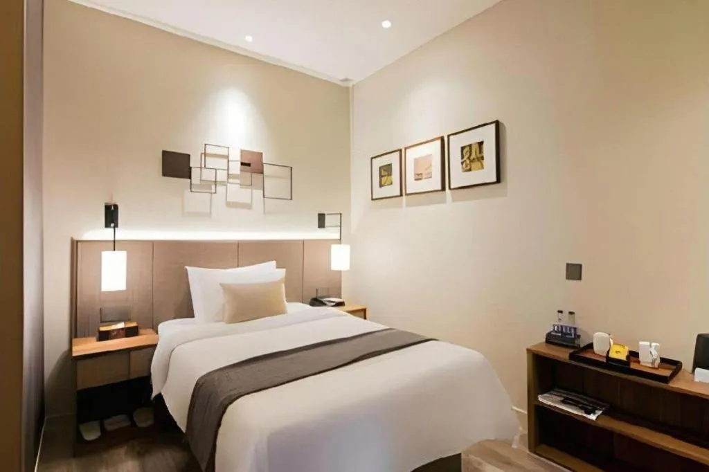 Bed in Home Inn Plus Shanghai Pudong Xinjinqiao Road