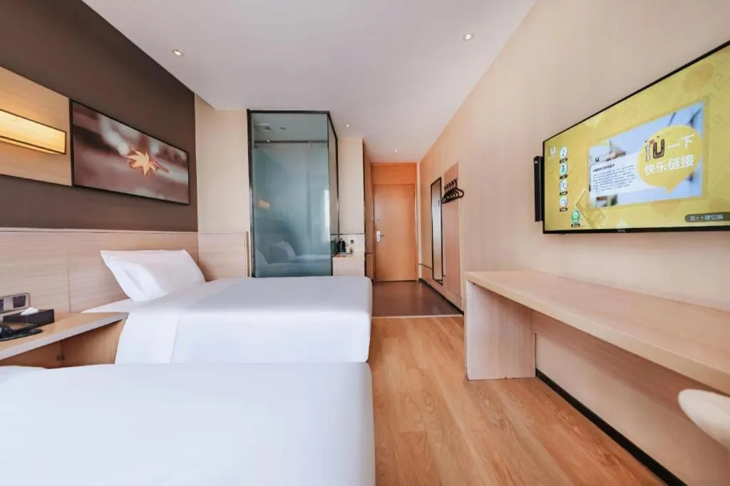 Bed in IU Hotel Kunming Jinma Bijifang Joy City