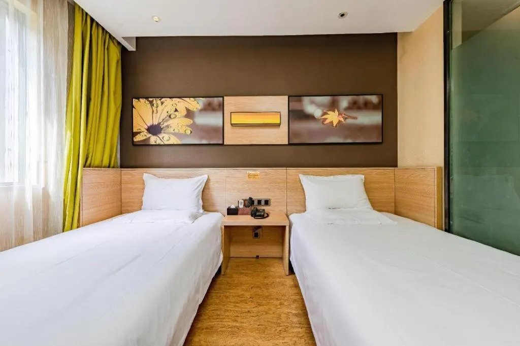 Bed in IU Hotel Kunming Jinma Bijifang Joy City