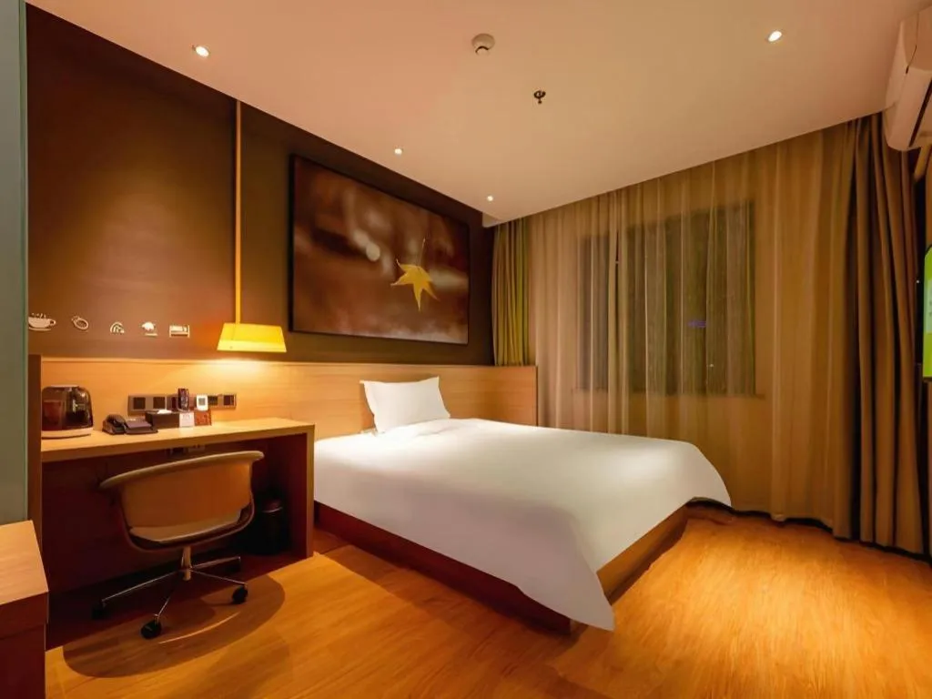 Bed in IU Hotel Kunming Jinma Bijifang Joy City