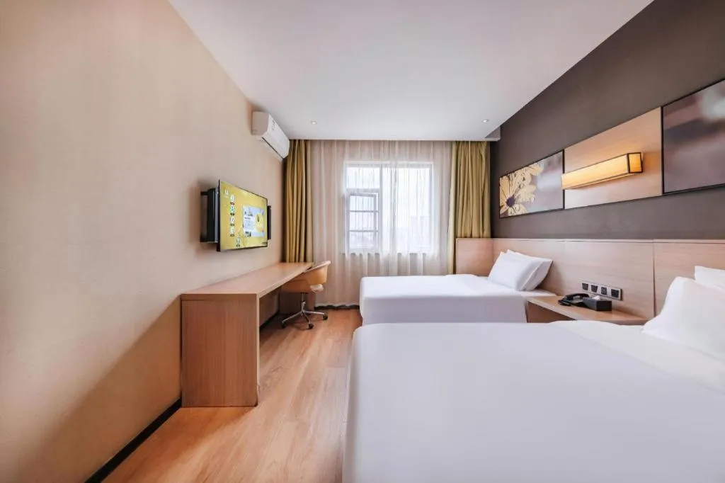 Bed in IU Hotel Kunming Jinma Bijifang Joy City