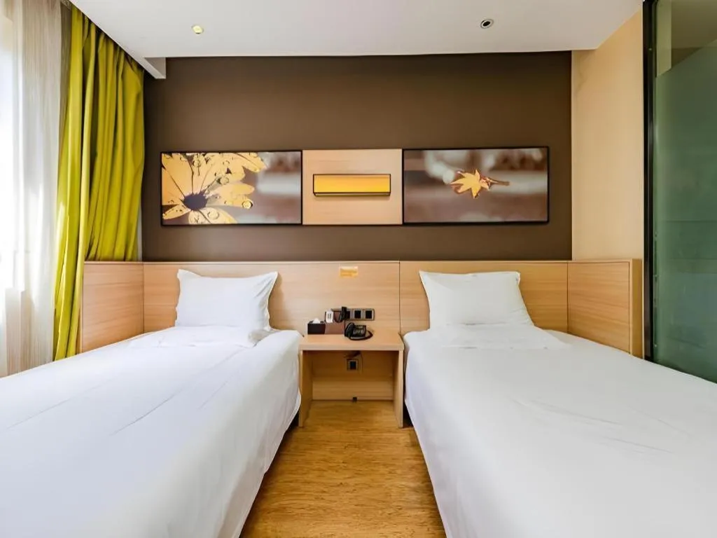 Bed in IU Hotel Kunming Jinma Bijifang Joy City