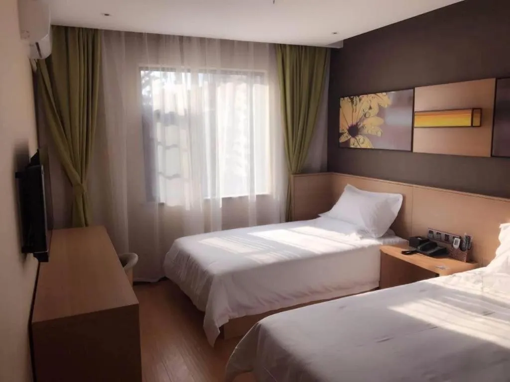 Bed in IU Hotel Kunming Jinma Bijifang Joy City