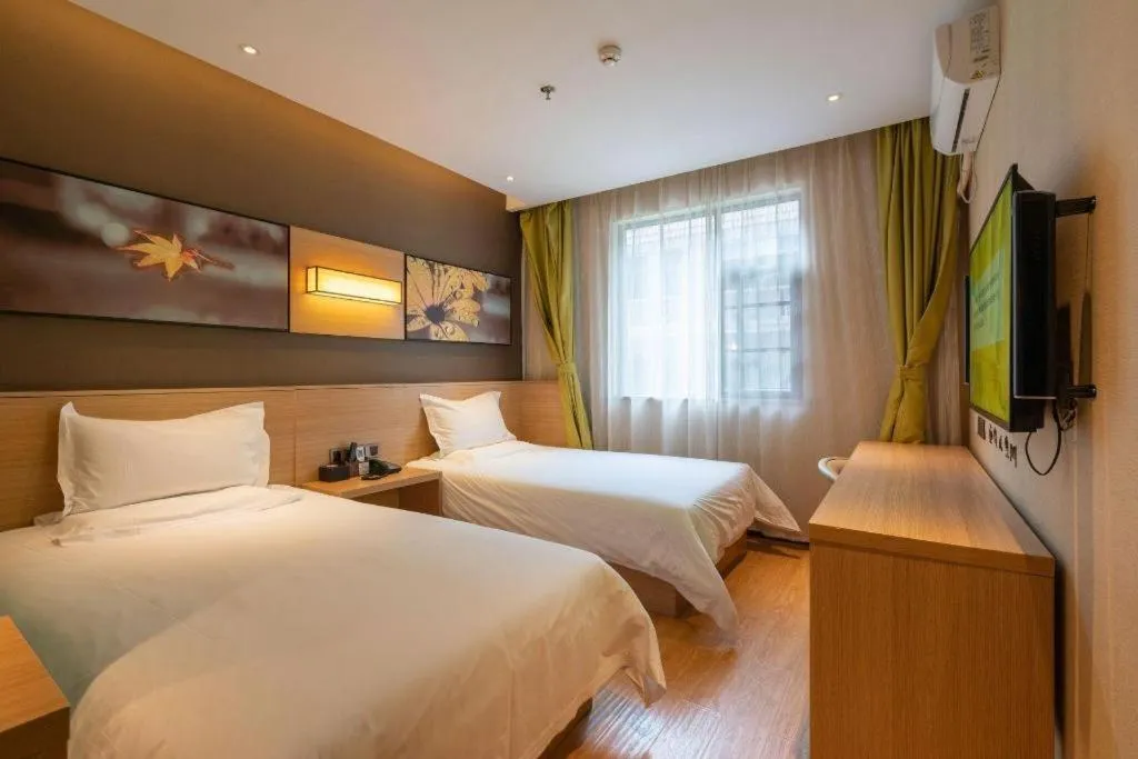 Bed in IU Hotel Kunming Jinma Bijifang Joy City