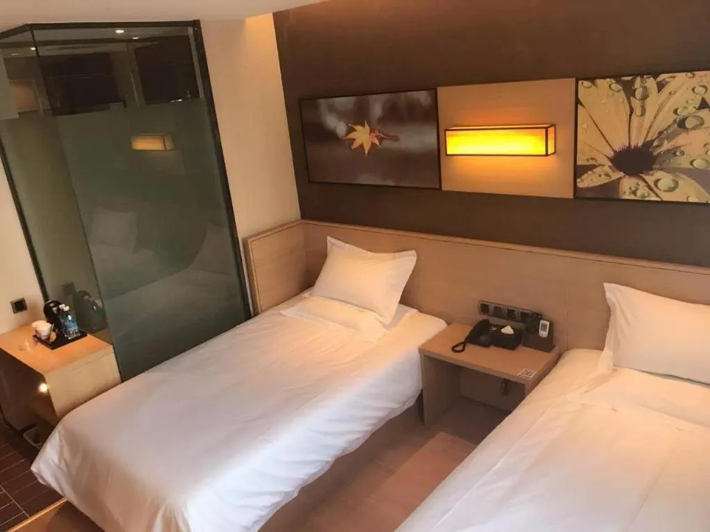 Bed in IU Hotel Kunming Jinma Bijifang Joy City