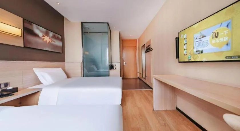 Bed in IU Hotel Kunming Jinma Bijifang Joy City