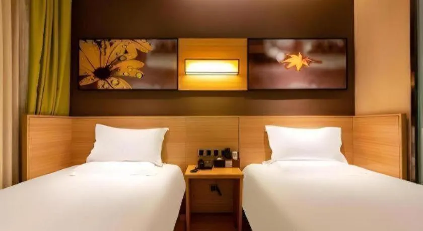 Bed in IU Hotel Kunming Jinma Bijifang Joy City