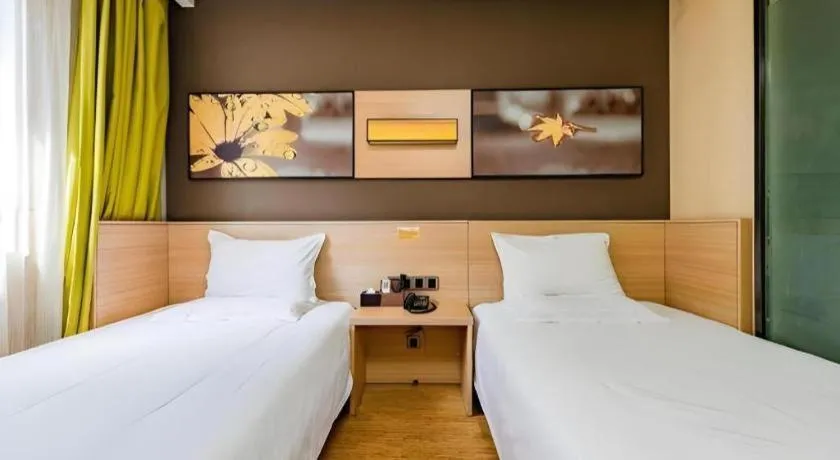 Bed in IU Hotel Kunming Jinma Bijifang Joy City