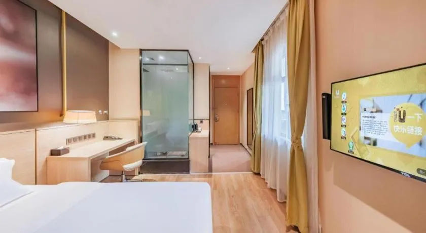 Bed in IU Hotel Kunming Jinma Bijifang Joy City