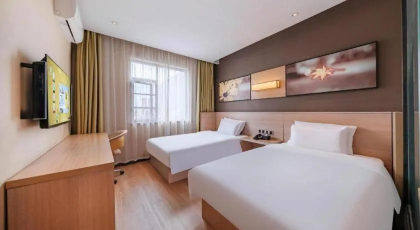 Bed in IU Hotel Kunming Jinma Bijifang Joy City