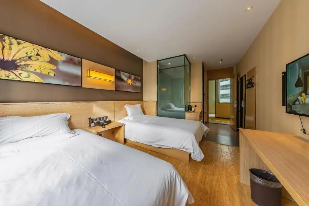 Bed in IU Hotel Kunming Jinma Bijifang Joy City