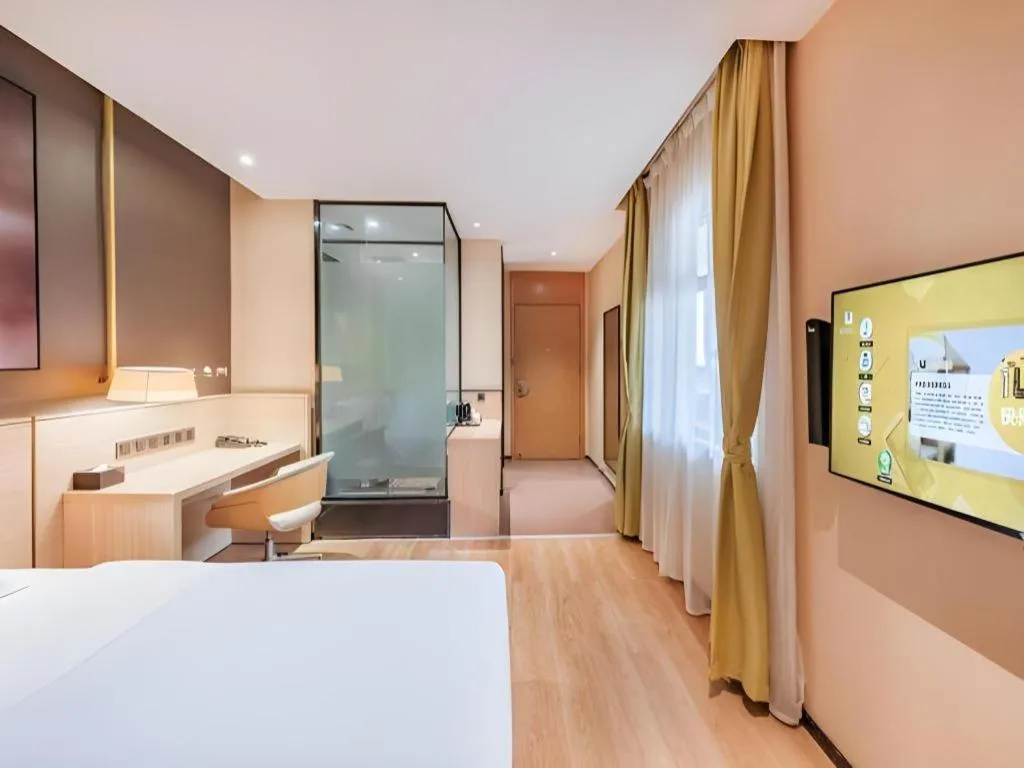 Bed in IU Hotel Kunming Jinma Bijifang Joy City