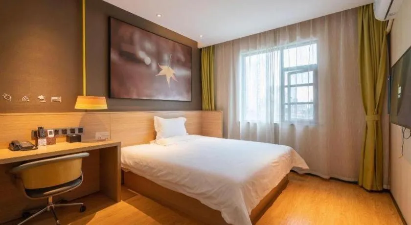 Bed in IU Hotel Kunming Jinma Bijifang Joy City
