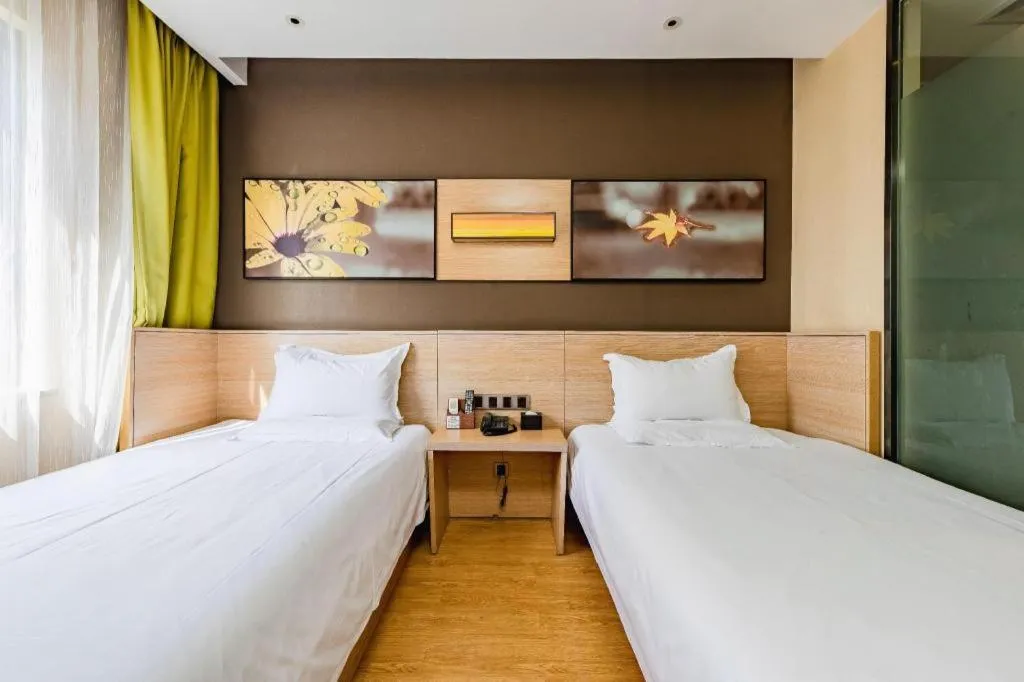 Bed in IU Hotel Kunming Jinma Bijifang Joy City