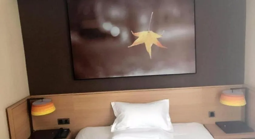 Bed in IU Hotel Kunming Jinma Bijifang Joy City