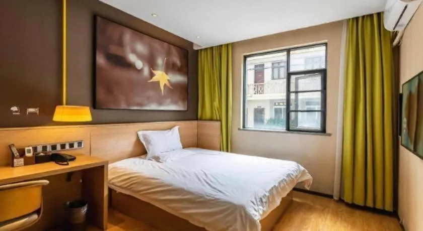 Bed in IU Hotel Kunming Jinma Bijifang Joy City