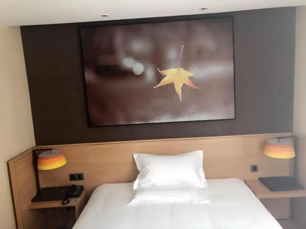 Bed in IU Hotel Kunming Jinma Bijifang Joy City