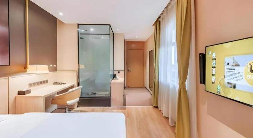 Bed in IU Hotel Kunming Jinma Bijifang Joy City