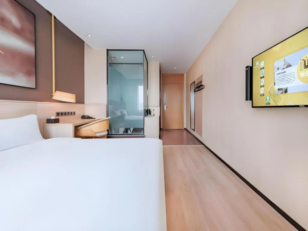 Bed in IU Hotel Kunming Jinma Bijifang Joy City