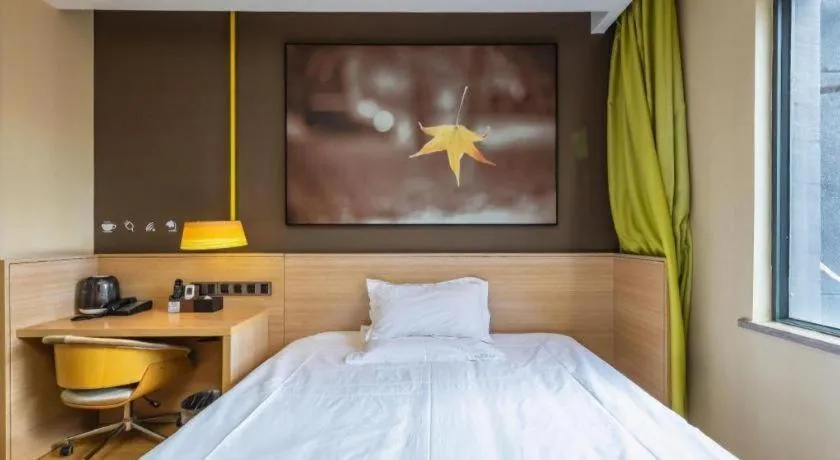 Bed in IU Hotel Kunming Jinma Bijifang Joy City