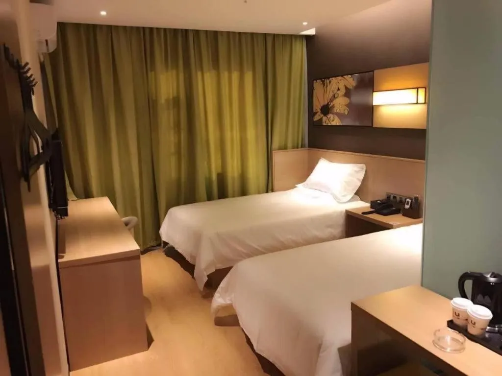 Bed in IU Hotel Kunming Jinma Bijifang Joy City