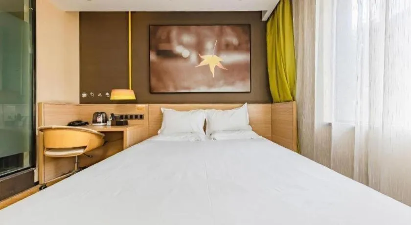 Bed in IU Hotel Kunming Jinma Bijifang Joy City