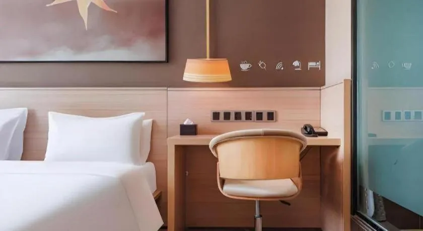 Bed in IU Hotel Kunming Jinma Bijifang Joy City