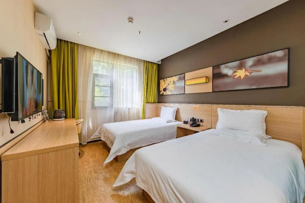 Bed in IU Hotel Kunming Jinma Bijifang Joy City