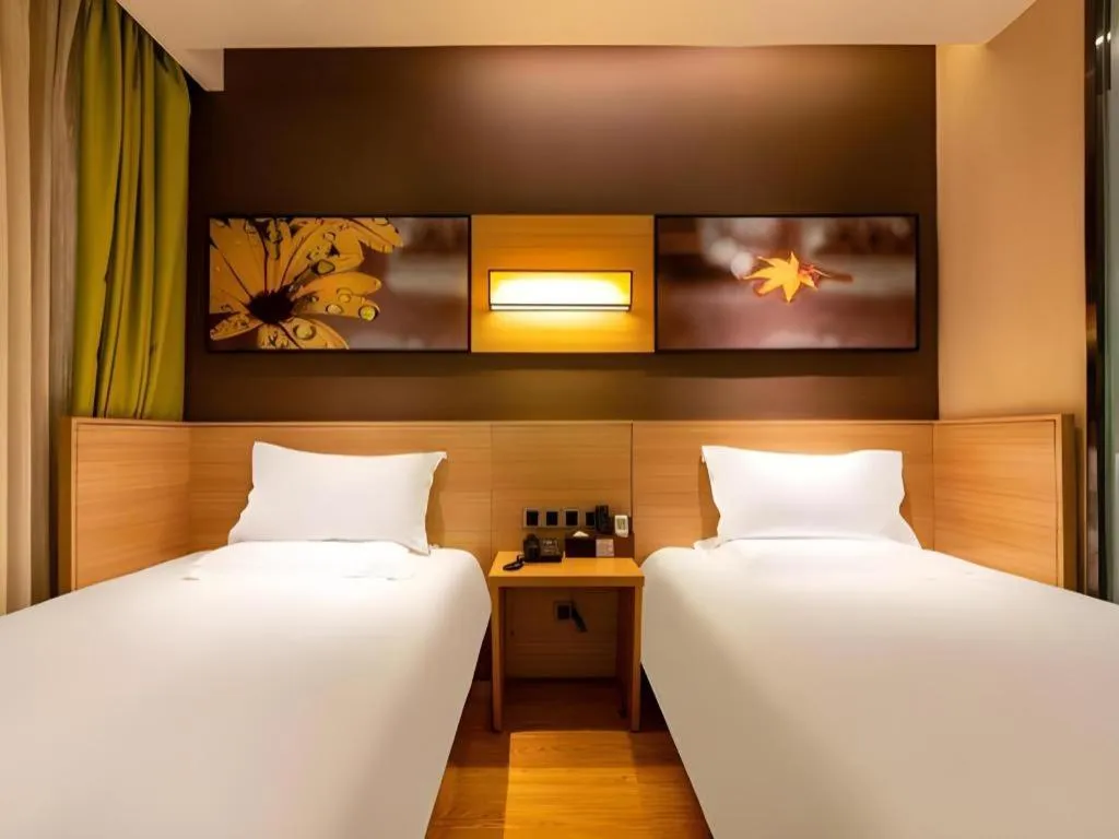 Bed in IU Hotel Kunming Jinma Bijifang Joy City